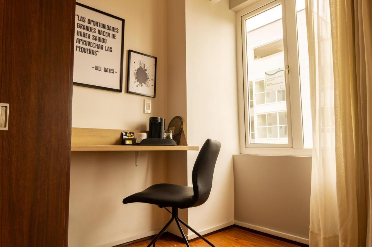 Quo Quality Hotel Manizales Exterior foto A typical study room
