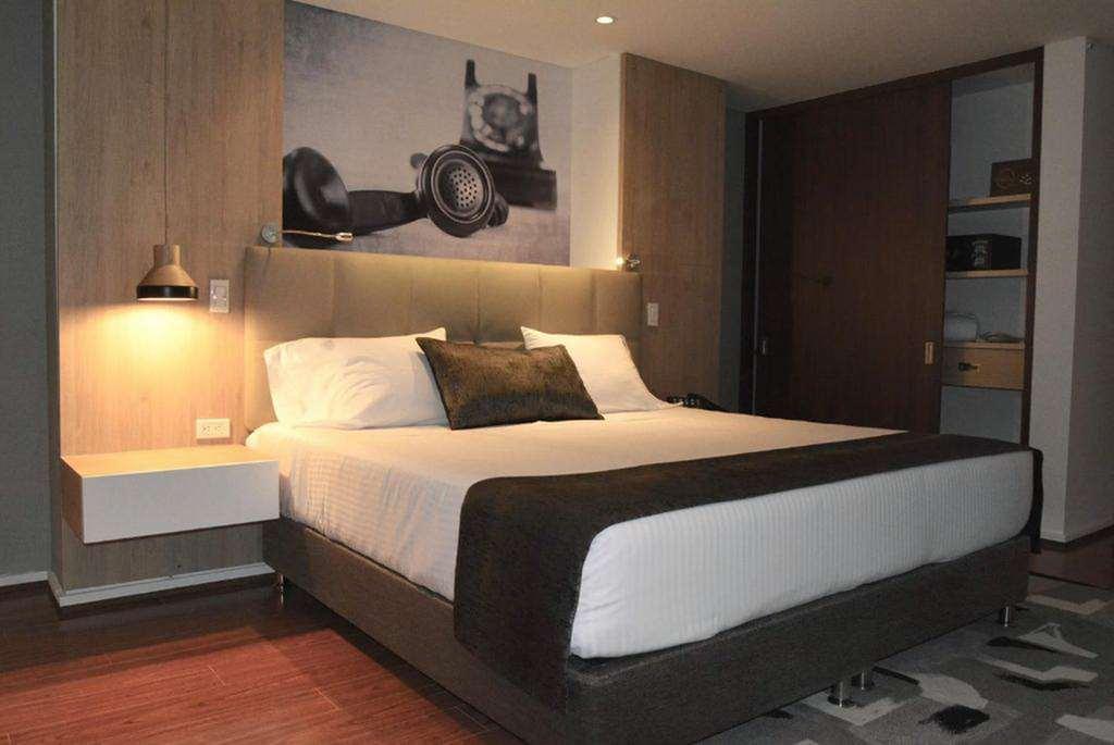 Quo Quality Hotel Manizales Cameră foto A bedroom at the hotel