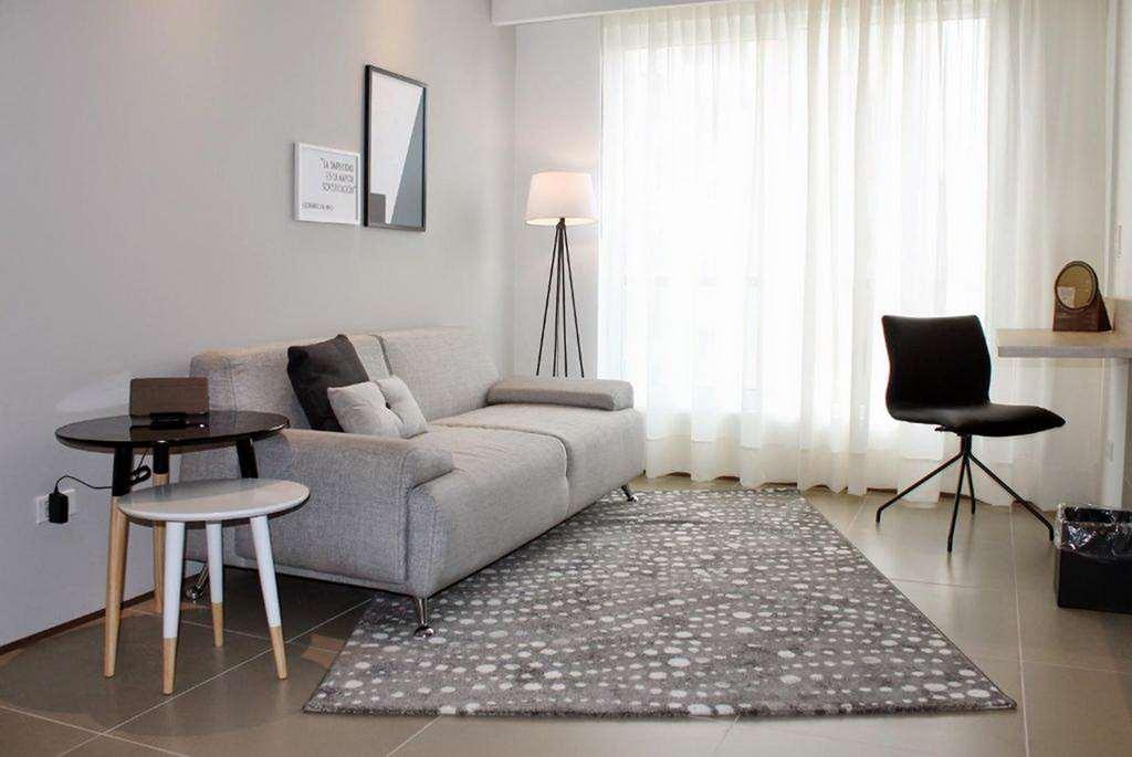 Quo Quality Hotel Manizales Cameră foto A living room with a rug