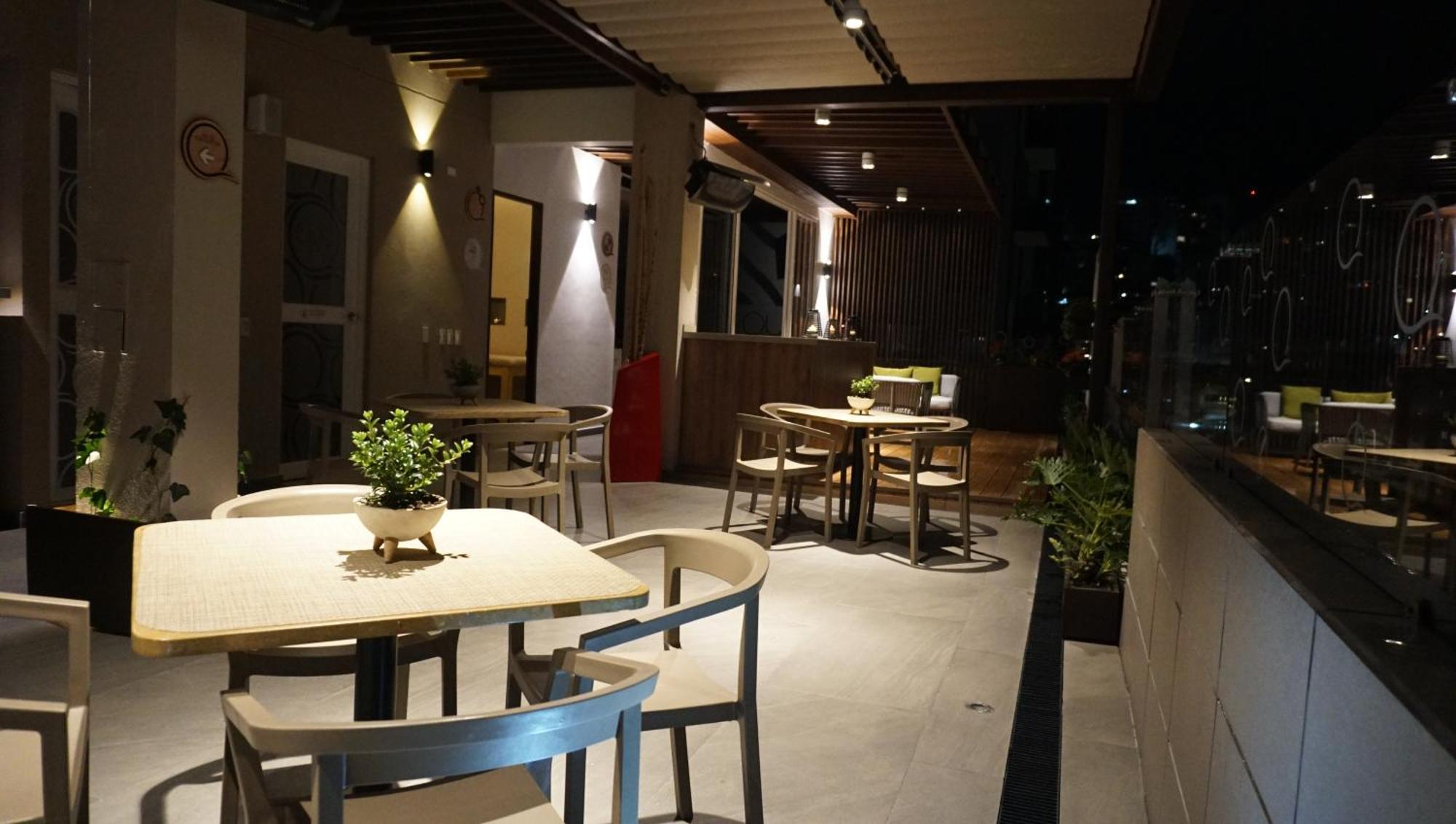 Quo Quality Hotel Manizales Exterior foto The interior of the restaurant