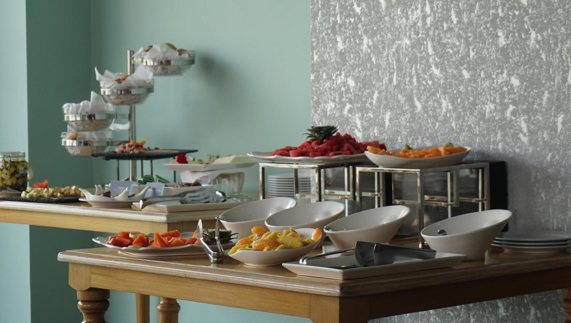Quo Quality Hotel Manizales Exterior foto A buffet