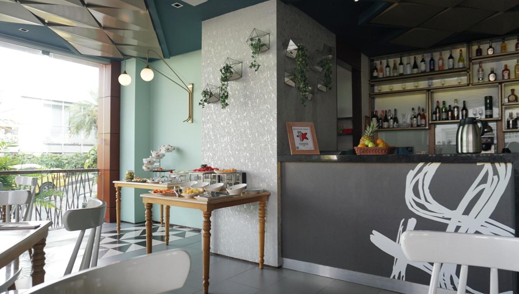 Quo Quality Hotel Manizales Exterior foto The interior of the restaurant